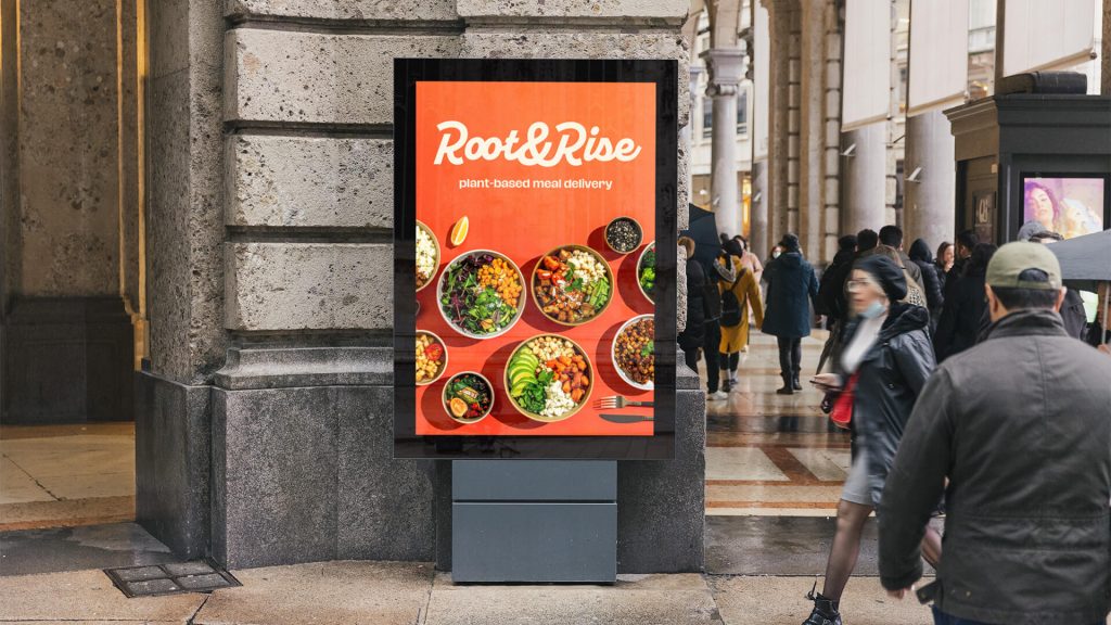 Billboard displaying an ad campaign design for a Plant-based Food Delivery service called Root & Rise